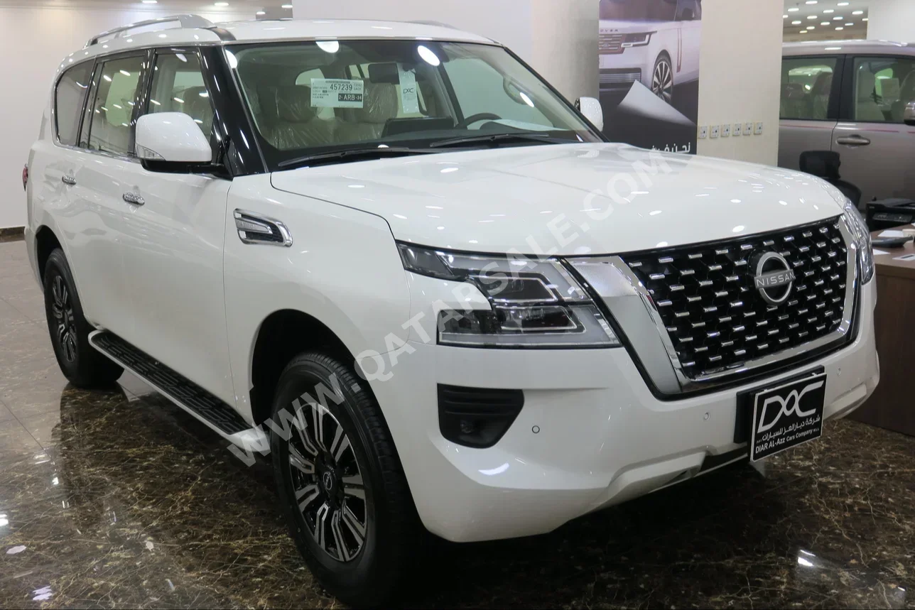 Nissan  Patrol  SE  2024  Automatic  0 Km  6 Cylinder  Four Wheel Drive (4WD)  SUV  White  With Warranty