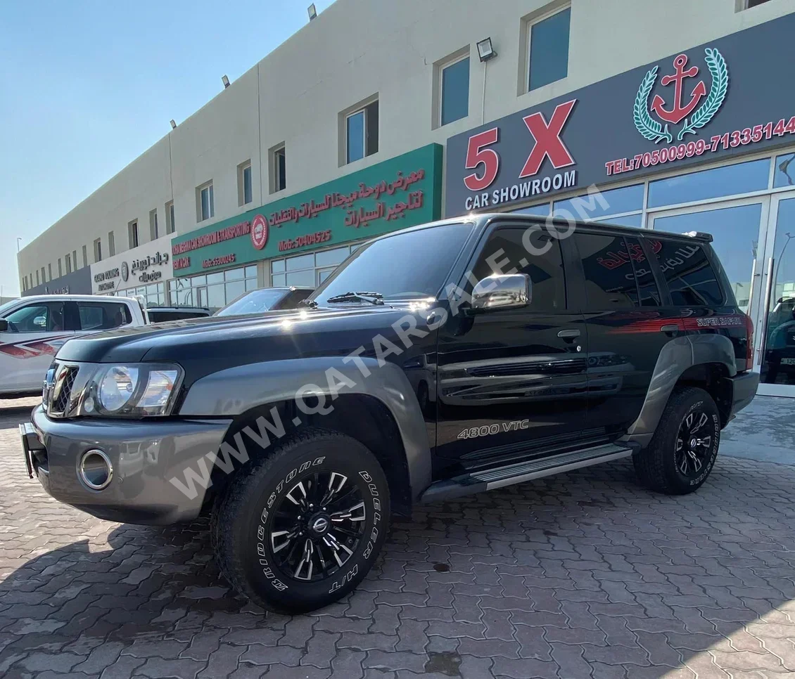 Nissan  Patrol  Super Safari  2023  Automatic  48,000 Km  6 Cylinder  Four Wheel Drive (4WD)  SUV  Black  With Warranty