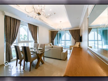 2 Bedrooms  Apartment  For Rent  in Doha -  The Pearl  Fully Furnished