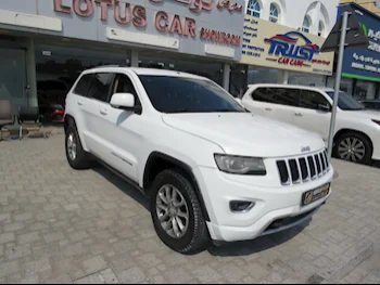 Jeep  Grand Cherokee  Laredo  2014  Automatic  260,000 Km  6 Cylinder  Four Wheel Drive (4WD)  SUV  White