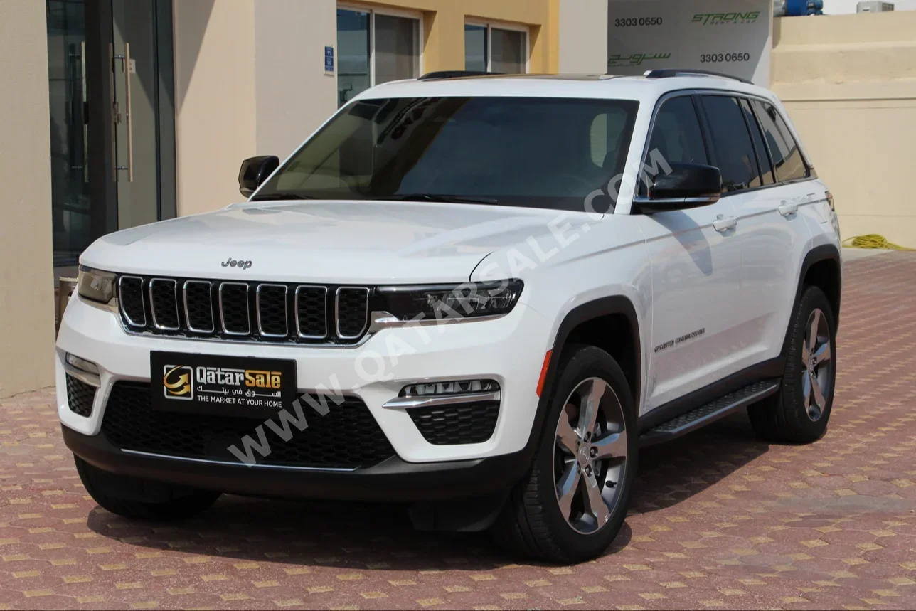 Jeep  Grand Cherokee  Limited  2022  Automatic  8,300 Km  8 Cylinder  Four Wheel Drive (4WD)  SUV  White  With Warranty