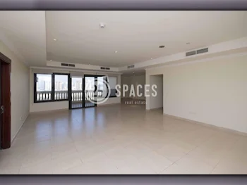 3 Bedrooms  Apartment  For Rent  in Doha -  The Pearl  Semi Furnished