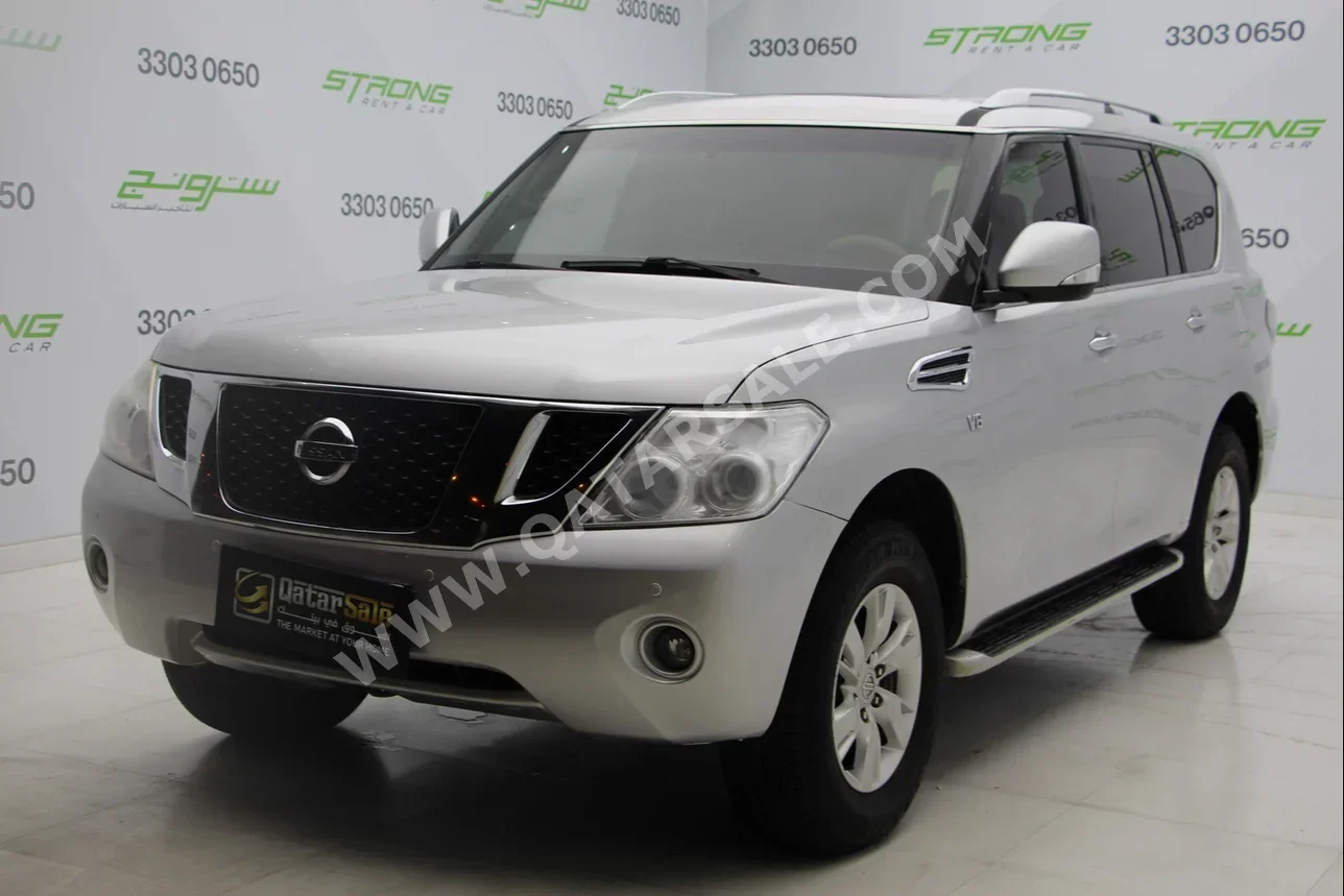 Nissan  Patrol  SE  2013  Automatic  210,000 Km  8 Cylinder  Four Wheel Drive (4WD)  SUV  Silver