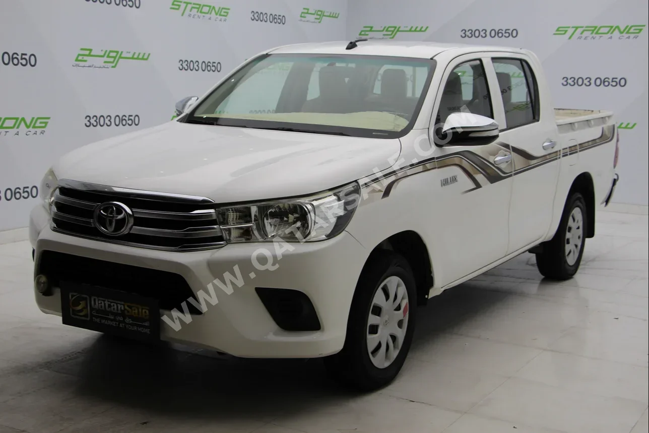  Toyota  Hilux  2017  Manual  137,000 Km  4 Cylinder  Rear Wheel Drive (RWD)  Pick Up  White  With Warranty
