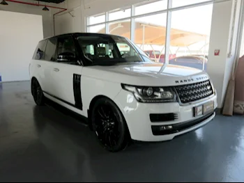 Land Rover  Range Rover  Vogue HSE  2014  Automatic  200,000 Km  8 Cylinder  Four Wheel Drive (4WD)  SUV  White