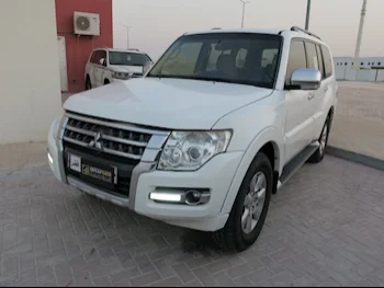 Mitsubishi  Pajero  GLS  2020  Automatic  128,000 Km  6 Cylinder  Four Wheel Drive (4WD)  SUV  White