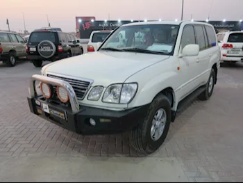 Lexus  LX  470  1999  Automatic  400,000 Km  8 Cylinder  Four Wheel Drive (4WD)  SUV  White