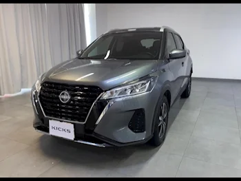 Nissan  Kicks  2024  Automatic  4,900 Km  4 Cylinder  Front Wheel Drive (FWD)  Hatchback  Gray  With Warranty