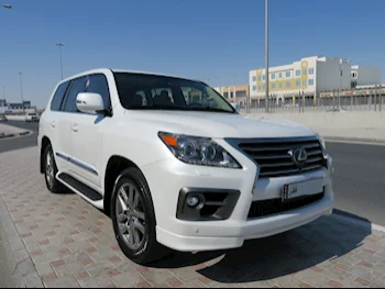  Lexus  LX  570  2014  Automatic  128,000 Km  8 Cylinder  Four Wheel Drive (4WD)  SUV  White  With Warranty