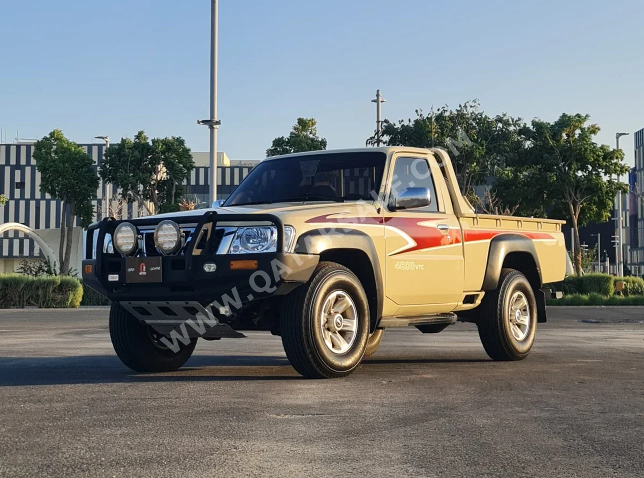 Nissan  Patrol  Pickup  2016  Manual  124,000 Km  6 Cylinder  Four Wheel Drive (4WD)  Pick Up  Beige