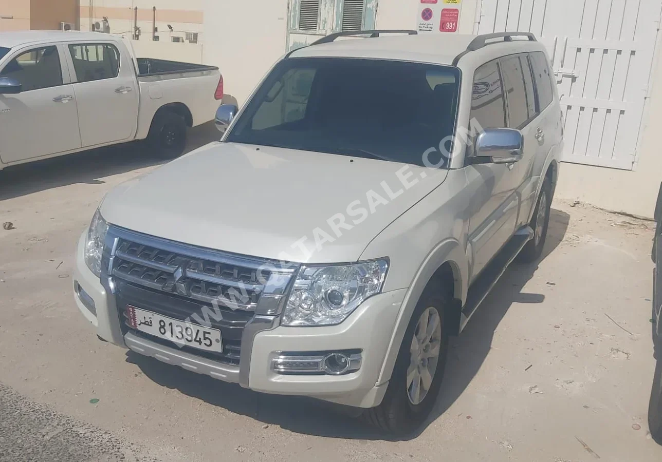  Mitsubishi  Pajero  2019  Automatic  99,000 Km  4 Cylinder  Four Wheel Drive (4WD)  SUV  White  With Warranty