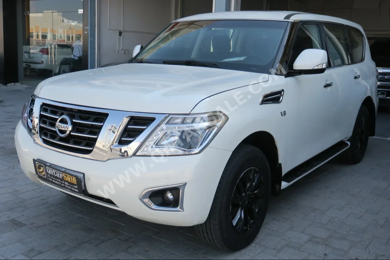 Nissan  Patrol  SE  2014  Automatic  247,000 Km  8 Cylinder  Four Wheel Drive (4WD)  SUV  White