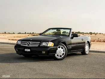 Mercedes-Benz  SL  500  1995  Automatic  95,000 Km  8 Cylinder  Rear Wheel Drive (RWD)  Convertible  Black