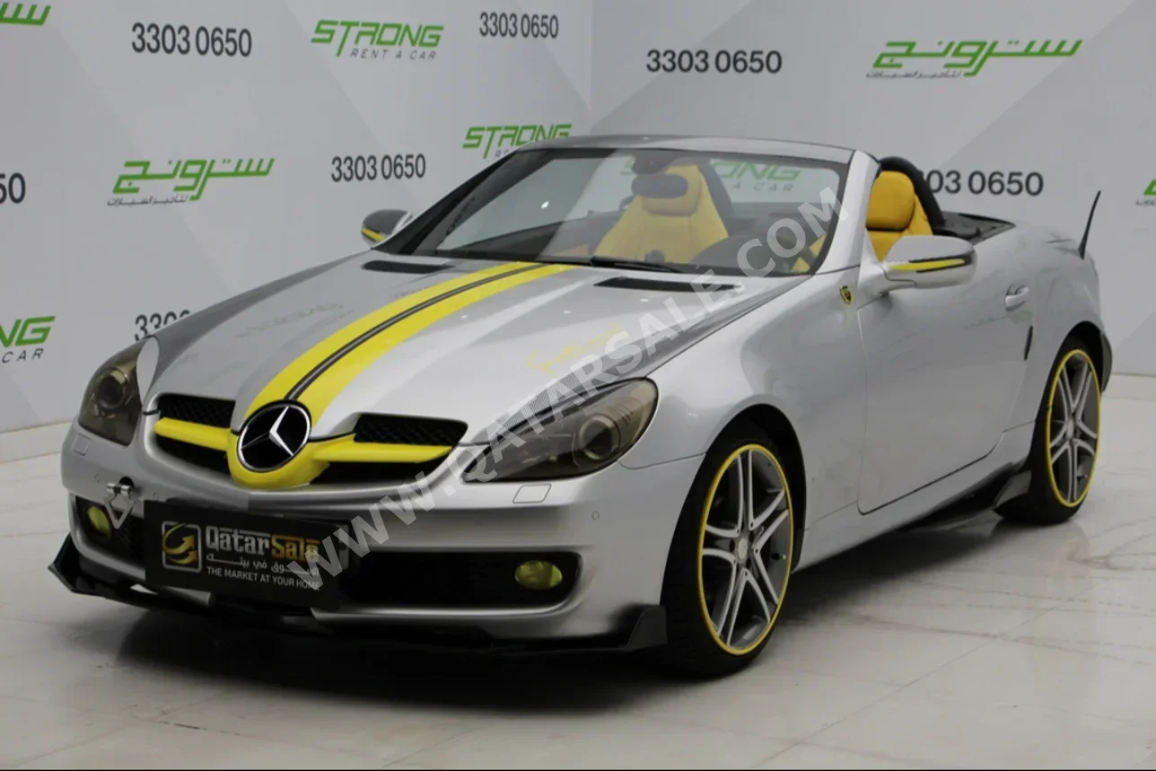 Mercedes-Benz  SLK  200  2009  Automatic  222,000 Km  4 Cylinder  Rear Wheel Drive (RWD)  Convertible  Silver