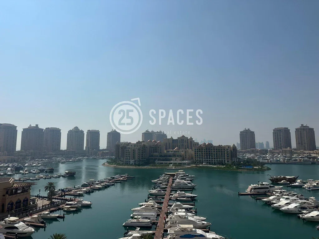 2 Bedrooms  Apartment  For Rent  in Doha -  The Pearl  Semi Furnished