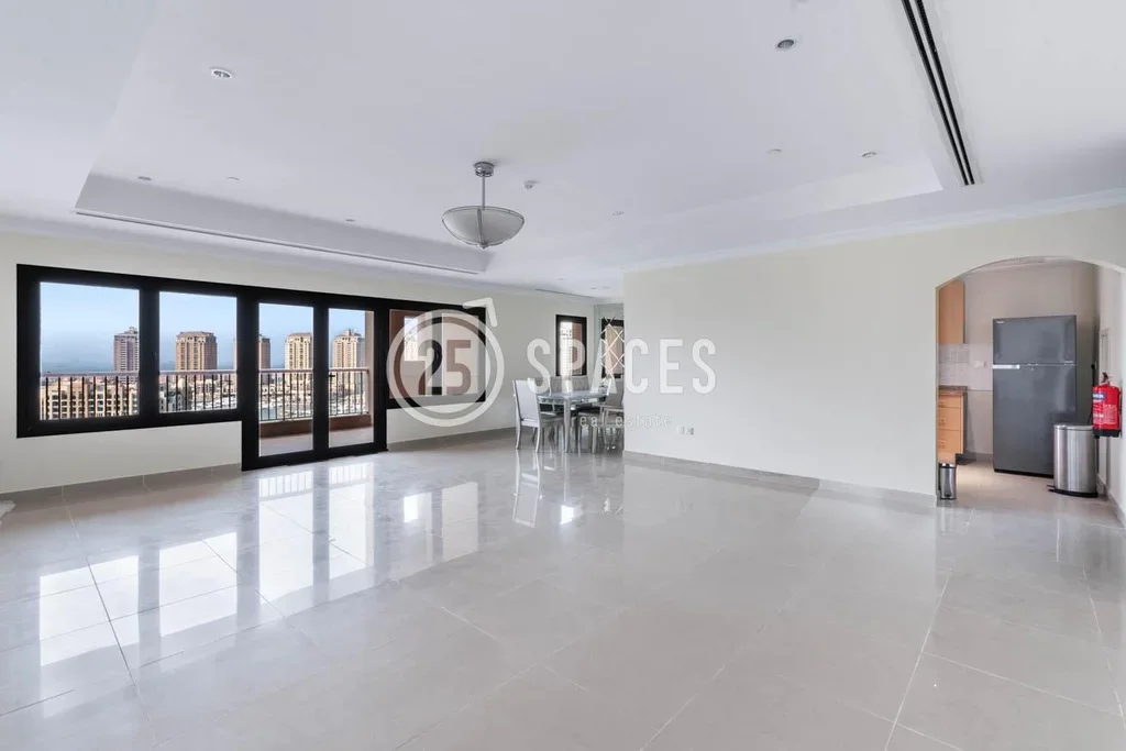 3 Bedrooms  Apartment  For Rent  in Doha -  The Pearl  Semi Furnished