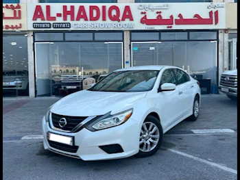 Nissan  Altima  2.5 S  2018  Automatic  64,000 Km  4 Cylinder  Front Wheel Drive (FWD)  Sedan  White