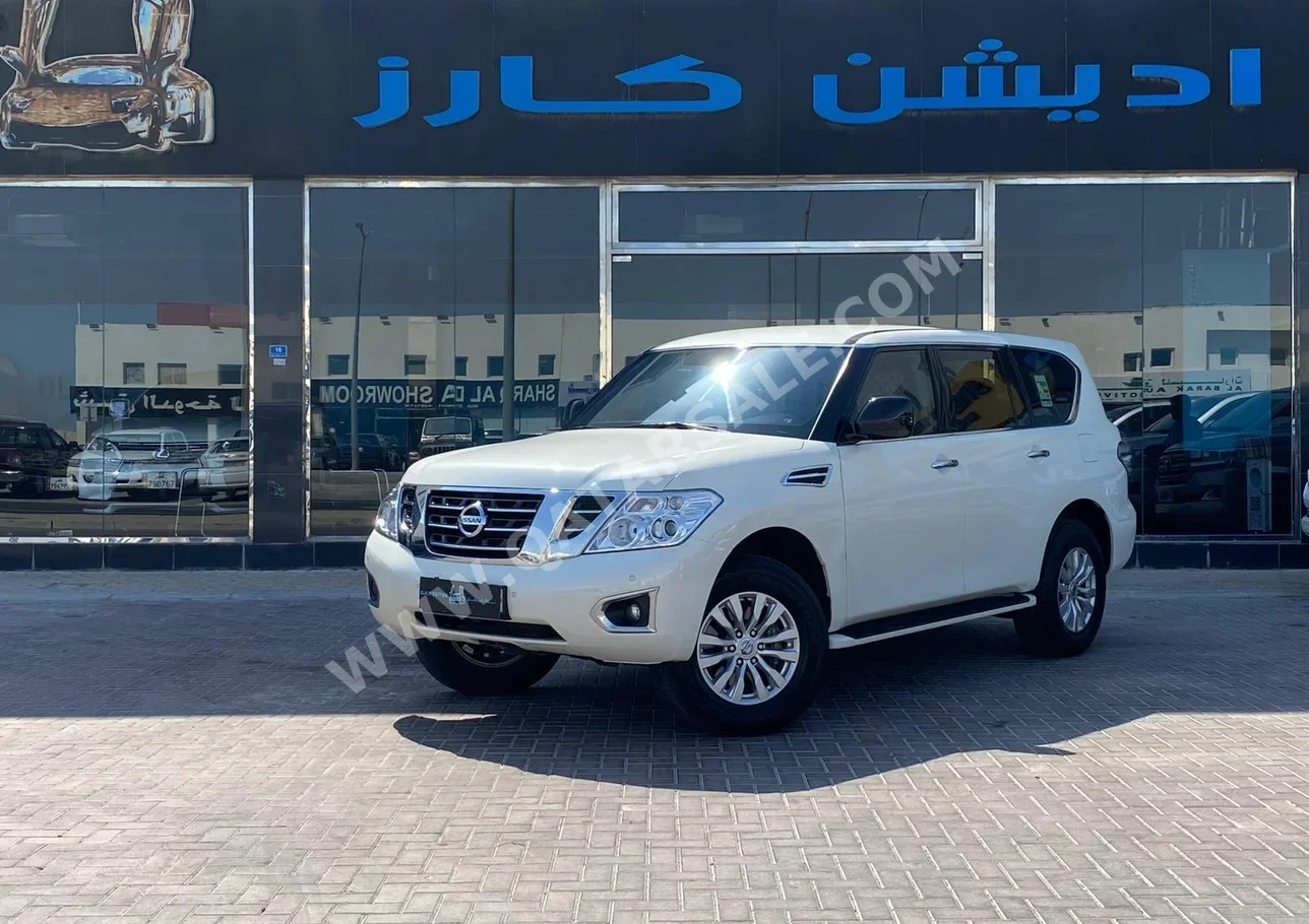 Nissan  Patrol  XE  2018  Automatic  59,000 Km  6 Cylinder  Four Wheel Drive (4WD)  SUV  White