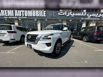  Nissan  Patrol  LE  2024  Automatic  0 Km  6 Cylinder  Four Wheel Drive (4WD)  SUV  White  With Warranty