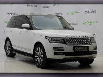 Land Rover  Range Rover  Vogue  2014  Automatic  209,000 Km  8 Cylinder  Four Wheel Drive (4WD)  SUV  White