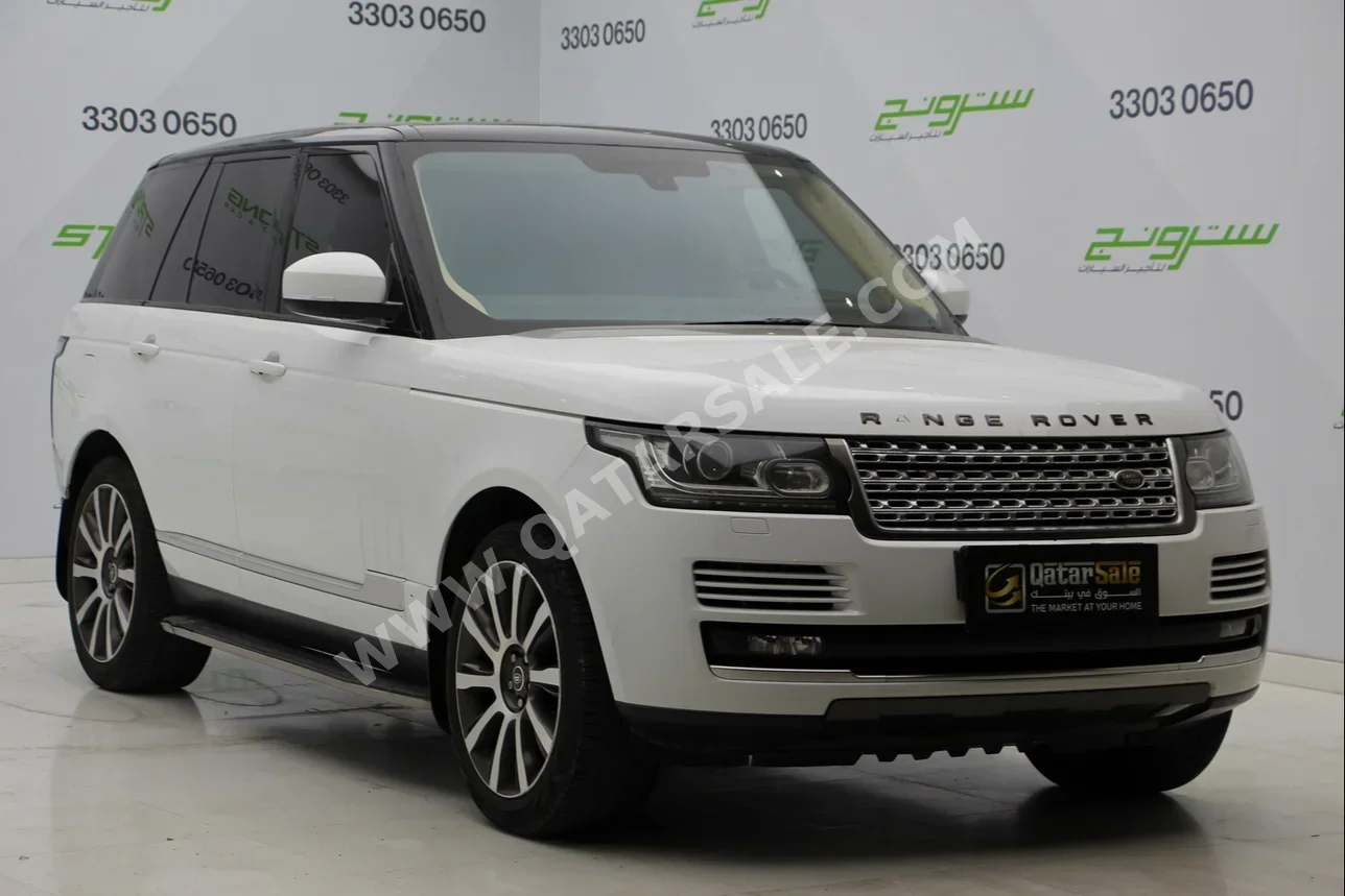 Land Rover  Range Rover  Vogue  2014  Automatic  209,000 Km  8 Cylinder  Four Wheel Drive (4WD)  SUV  White