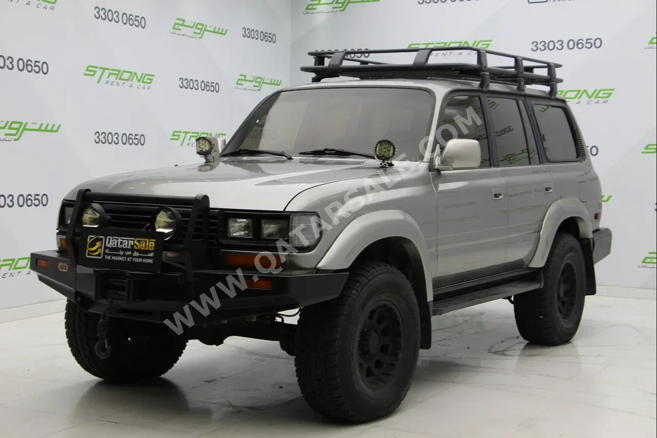 Lexus  LX  450  1995  Automatic  152,000 Km  6 Cylinder  Four Wheel Drive (4WD)  SUV  Gray