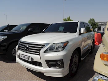  Lexus  LX  570 S  2014  Automatic  265,000 Km  8 Cylinder  Four Wheel Drive (4WD)  SUV  White  With Warranty