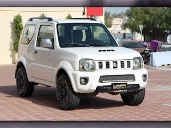 Suzuki  Jimny  2013  Automatic  157,000 Km  4 Cylinder  Four Wheel Drive (4WD)  SUV  White