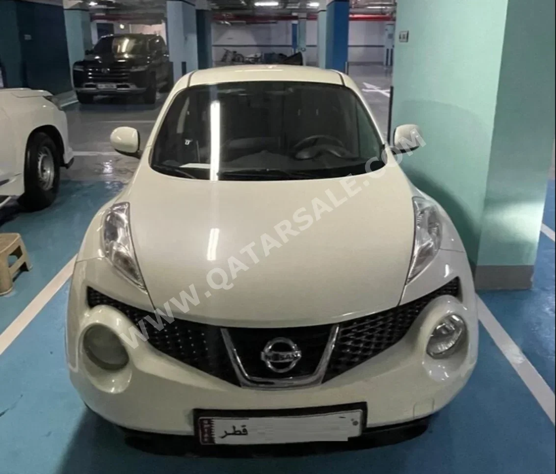 Nissan  Juke  2012  Automatic  118,500 Km  4 Cylinder  Hatchback  White