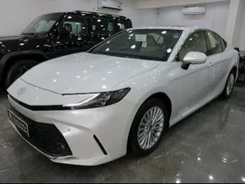 Toyota  Camry  LE  2025  Automatic  0 Km  4 Cylinder  Front Wheel Drive (FWD)  Sedan  White  With Warranty