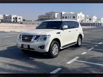 Nissan  Patrol  SE  2014  Automatic  253,000 Km  8 Cylinder  Four Wheel Drive (4WD)  SUV  White