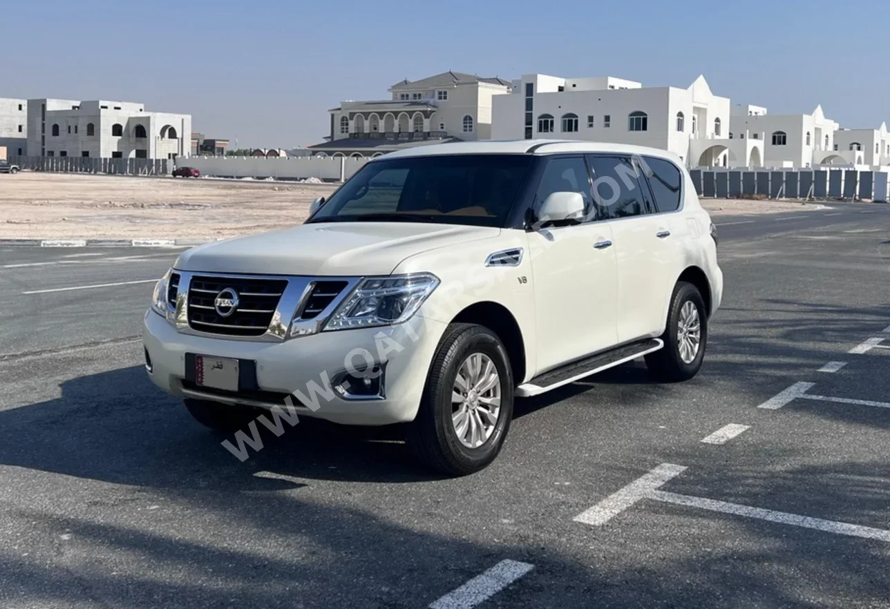 Nissan  Patrol  SE  2014  Automatic  253,000 Km  8 Cylinder  Four Wheel Drive (4WD)  SUV  White