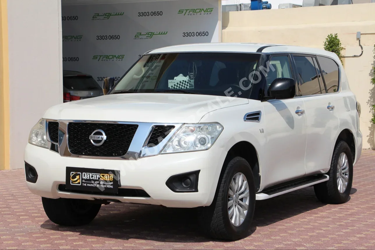 Nissan  Patrol  SE  2016  Automatic  167,000 Km  8 Cylinder  Four Wheel Drive (4WD)  SUV  White