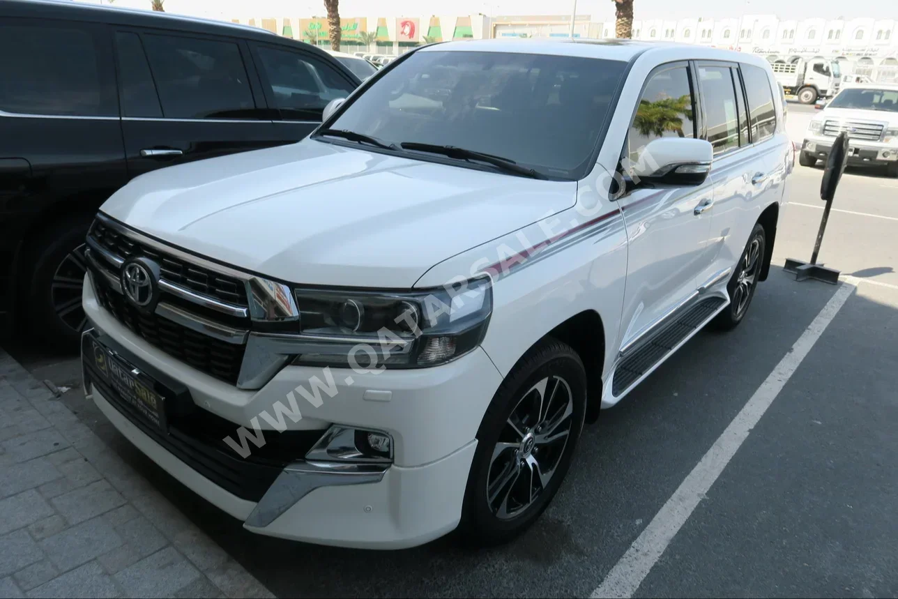 Toyota  Land Cruiser  GXR- Grand Touring  2021  Automatic  56,000 Km  8 Cylinder  Four Wheel Drive (4WD)  SUV  White