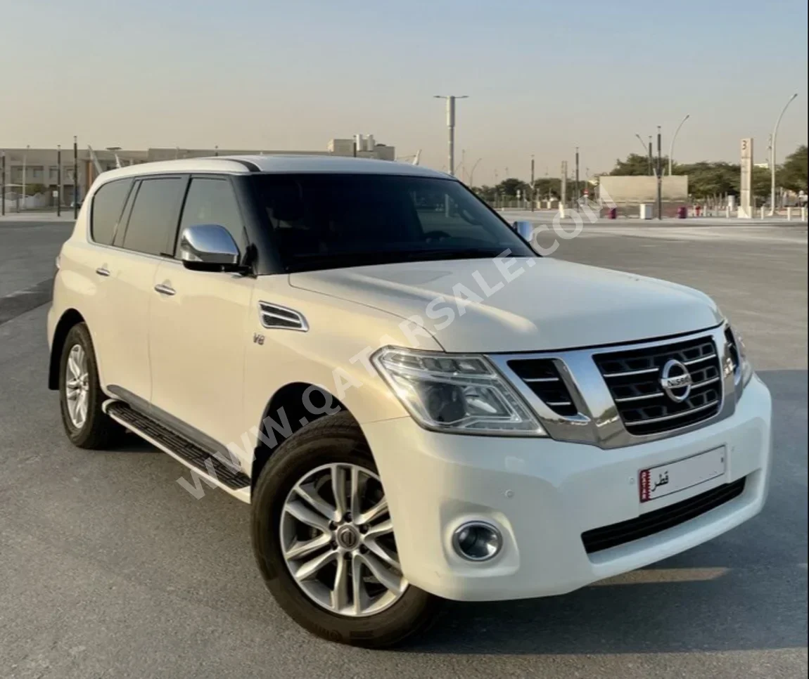 Nissan  Patrol  Platinum  2012  Automatic  224,000 Km  8 Cylinder  Four Wheel Drive (4WD)  SUV  White