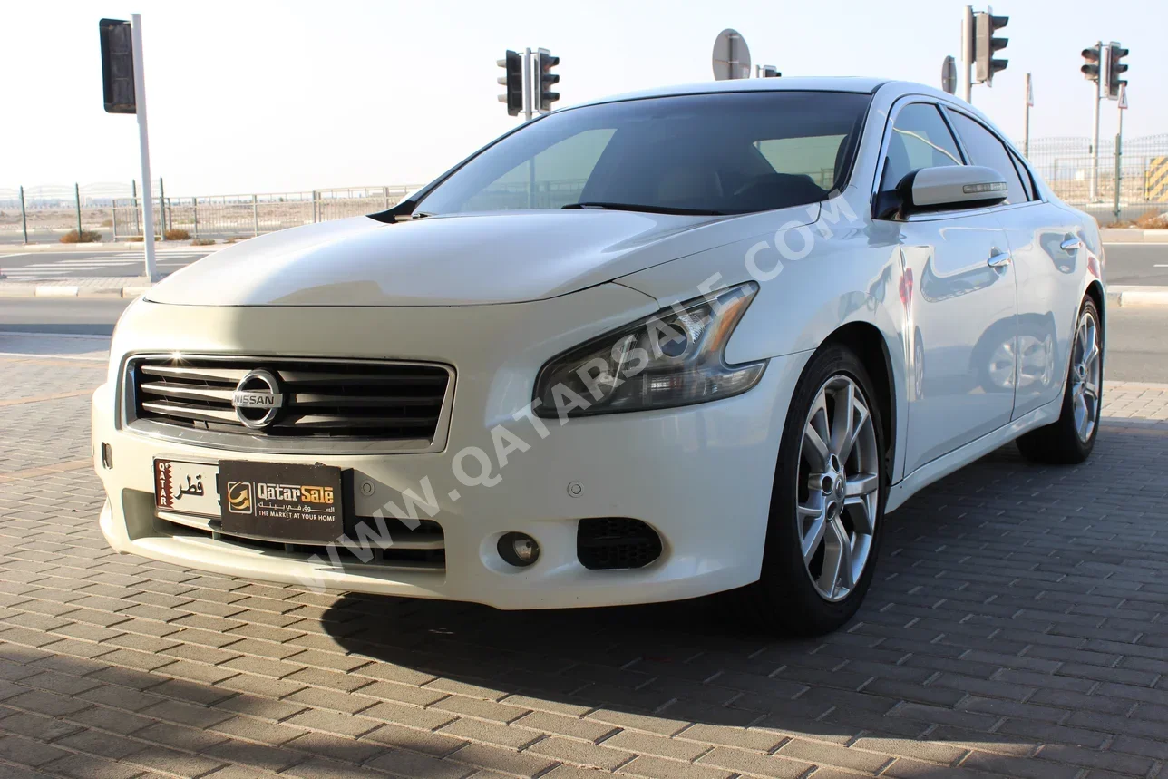 Nissan  Maxima  2013  Automatic  250,000 Km  6 Cylinder  Rear Wheel Drive (RWD)  Sedan  White