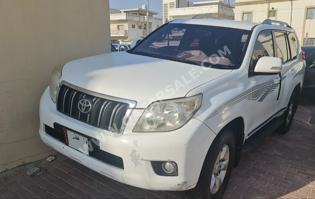 Toyota  Prado  TXL  2012  Automatic  275,000 Km  6 Cylinder  Four Wheel Drive (4WD)  SUV  White