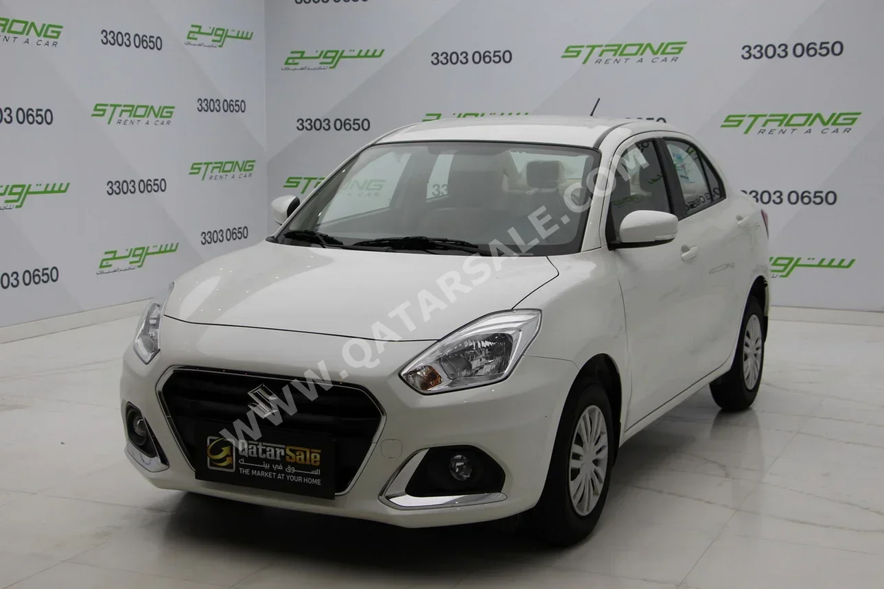 Suzuki  Dzire  2024  Automatic  19,000 Km  4 Cylinder  Front Wheel Drive (FWD)  Sedan  White  With Warranty