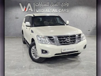 Nissan  Patrol  SE  2014  Automatic  194,000 Km  8 Cylinder  Four Wheel Drive (4WD)  SUV  White