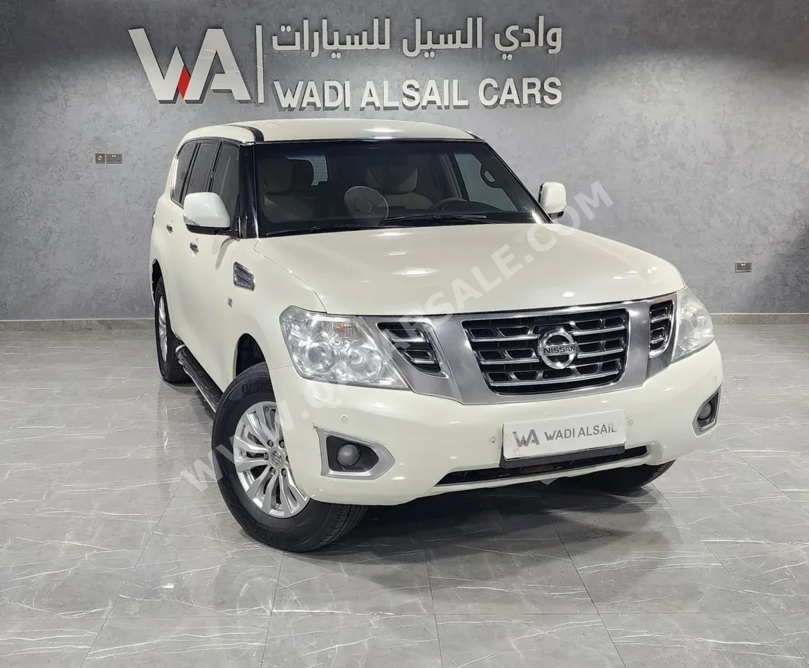 Nissan  Patrol  SE  2014  Automatic  194,000 Km  8 Cylinder  Four Wheel Drive (4WD)  SUV  White