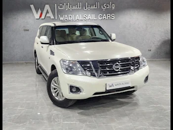 Nissan  Patrol  SE  2015  Automatic  174,000 Km  8 Cylinder  Four Wheel Drive (4WD)  SUV  White