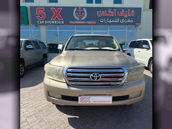  Toyota  Land Cruiser  GXR  2010  Automatic  427,000 Km  8 Cylinder  Four Wheel Drive (4WD)  SUV  Gold  With Warranty