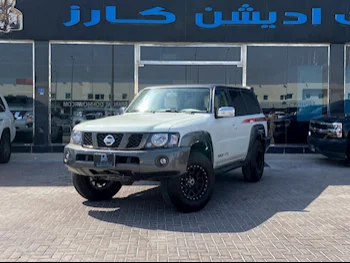 Nissan  Patrol  Safari  2005  Manual  371,000 Km  6 Cylinder  Four Wheel Drive (4WD)  SUV  White