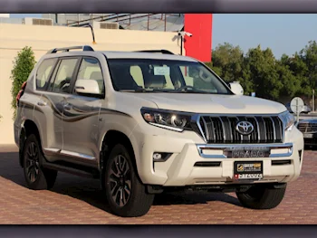 Toyota  Prado  TXL  2023  Automatic  7,000 Km  6 Cylinder  Four Wheel Drive (4WD)  SUV  White  With Warranty