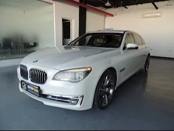 BMW  7-Series  740 i  2015  Automatic  140,000 Km  6 Cylinder  All Wheel Drive (AWD)  Sedan  White