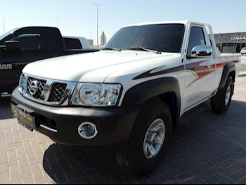 Nissan  Patrol  SGL  2021  Manual  58,000 Km  6 Cylinder  Four Wheel Drive (4WD)  Pick Up  White