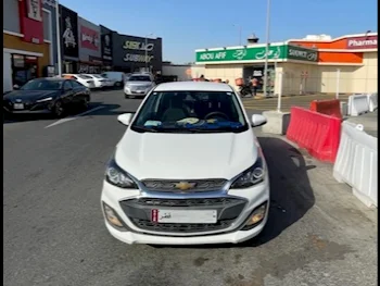 Chevrolet  Spark  2019  Automatic  118,000 Km  4 Cylinder  Front Wheel Drive (FWD)  Hatchback  White