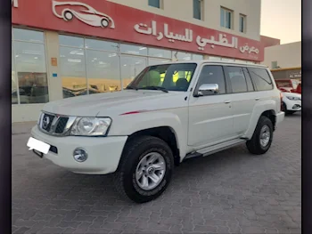 Nissan  Patrol  Safari  2023  Automatic  8٬000 Km  6 Cylinder  Four Wheel Drive (4WD)  SUV  White  With Warranty