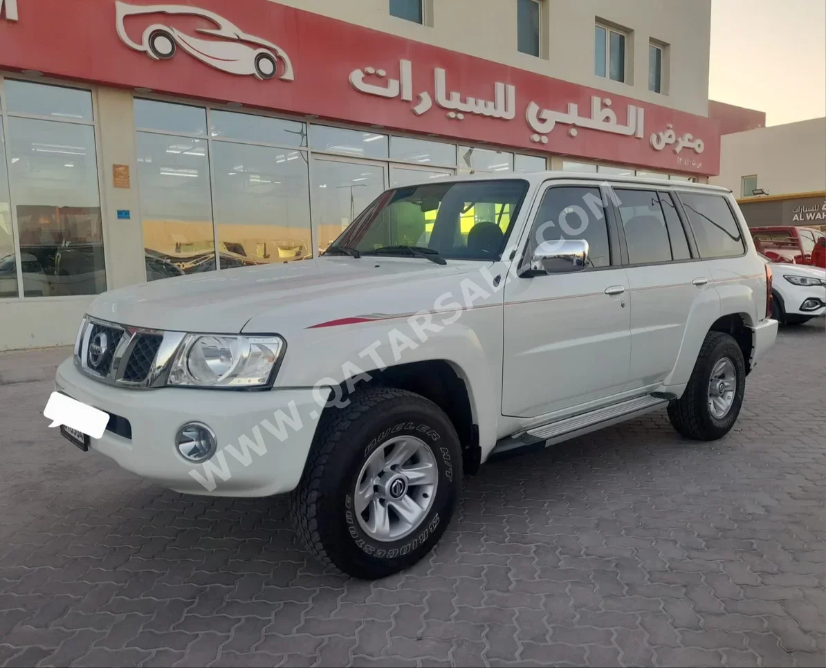 Nissan  Patrol  Safari  2023  Automatic  8٬000 Km  6 Cylinder  Four Wheel Drive (4WD)  SUV  White  With Warranty