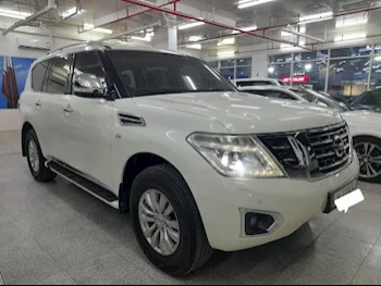 Nissan  Patrol  SE  2016  Automatic  228,000 Km  8 Cylinder  Four Wheel Drive (4WD)  SUV  White